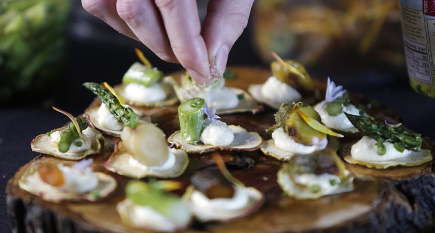 Assistant chef Michael Monteleone puts a finishing touch on cannabis-infused vegetable tarts. As more states legalize the use of recreational marijuana, the California chef is aiming to elevate haute cuisine to a new level.