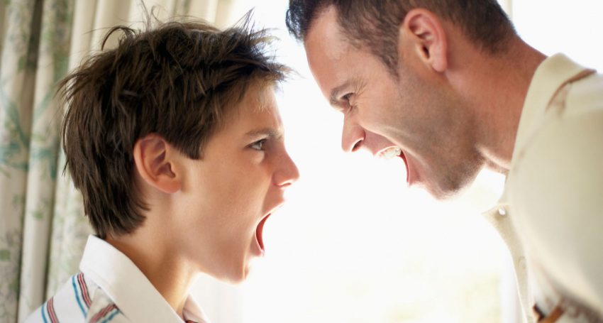Father and Son Shouting at Each Other --- Image by © Royalty-Free/Corbis