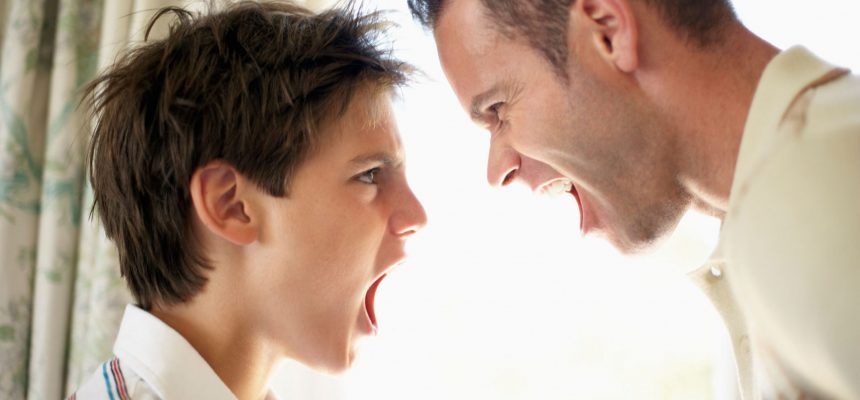 Father and Son Shouting at Each Other --- Image by © Royalty-Free/Corbis